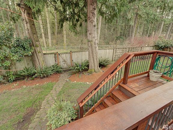 Backyard has gate access to the Lake Youngs walking trail that runs parallel to the greenbelt