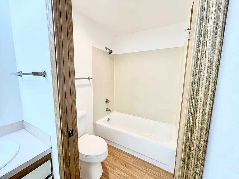 Shower/Tub area with pocket door.