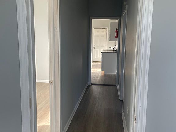Hallway , entrance to first bedroom on left and second bedroom on right