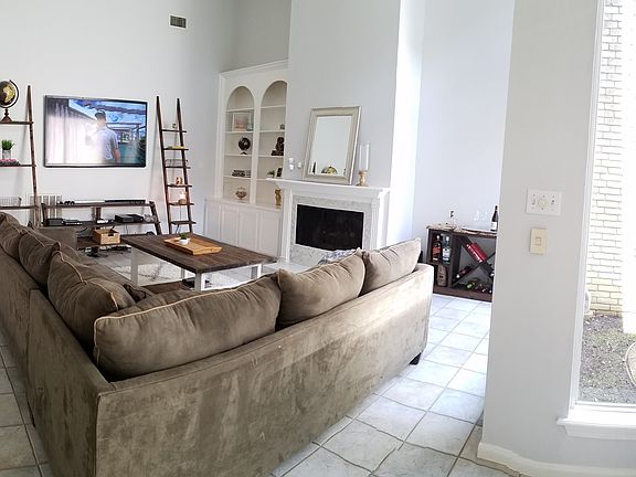 living room with 16'ceilings
