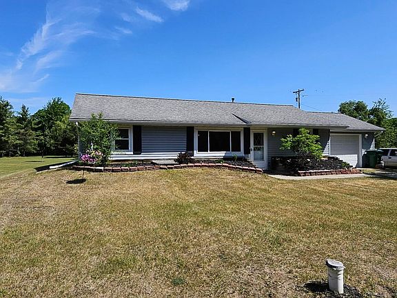 5th image of 9711 E River Rd