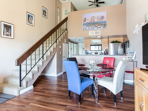 Dining area showing loft and kitchen