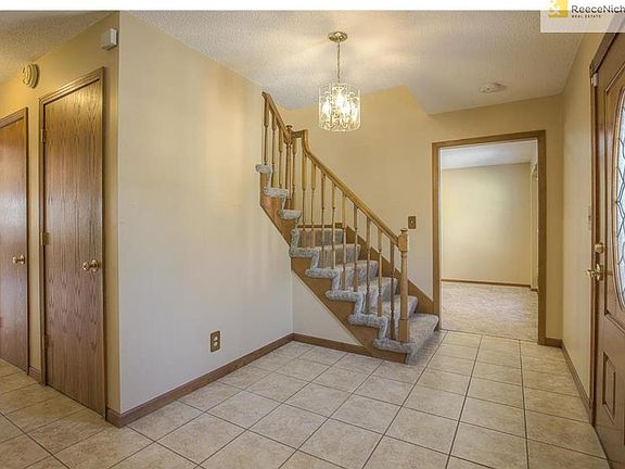 Entryway leads to formal living and dining rooms