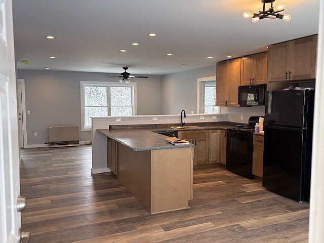 Open Concept Kitchen and living room. Room for stools at the counter
