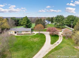 867 Cramton Ave NE, Ada, MI 49301