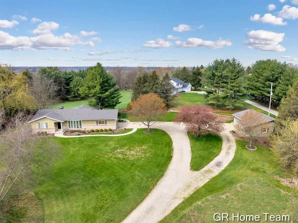 867 Cramton Ave NE, Ada, MI 49301