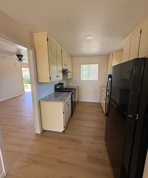 Beautiful kitchen with brand new appliances.