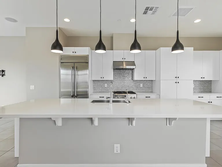 Huge kitchen with luxury appliances and gas stove