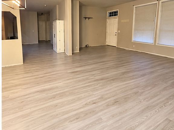 from dining room into living room to right. Family room straight ahead