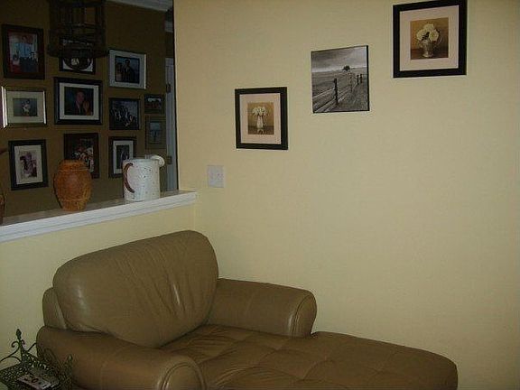Livingroom. Half wall shows view of hallway