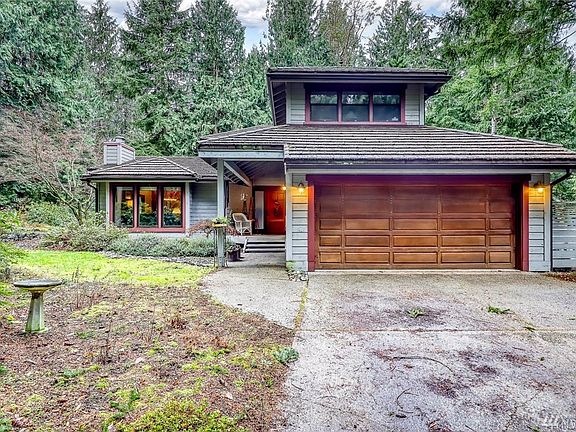 As you approach.  Two car garage w/additional heated shop space.