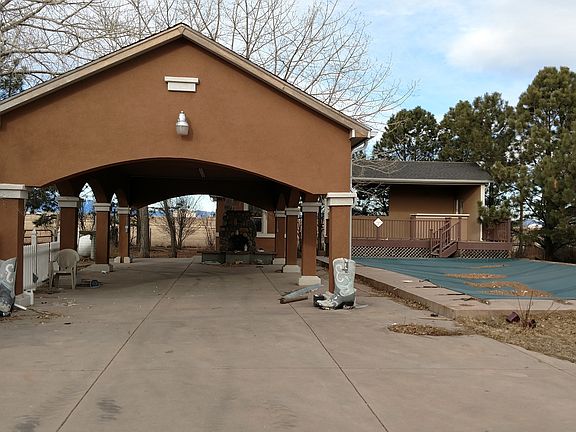 Pool and oversized carport!