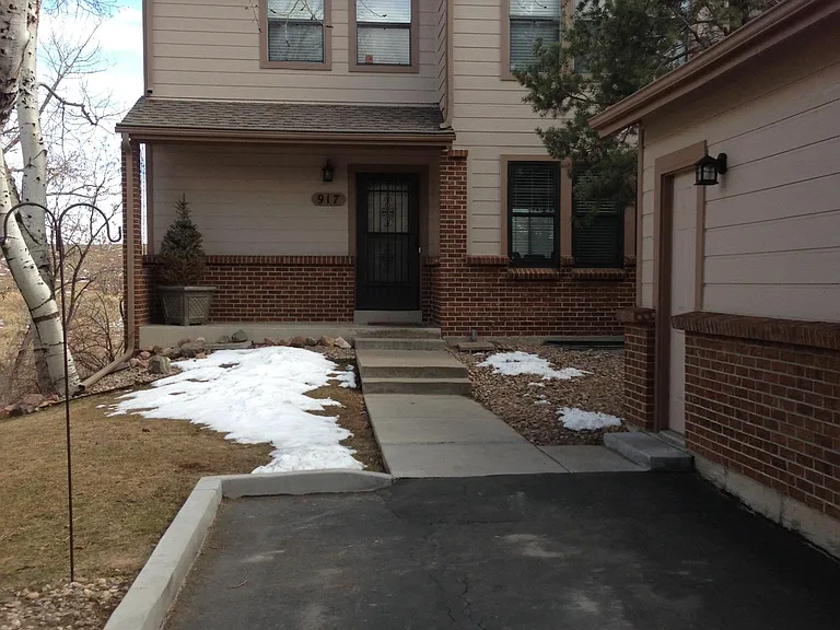 Front of house, including dedicated parking space and detached single garage