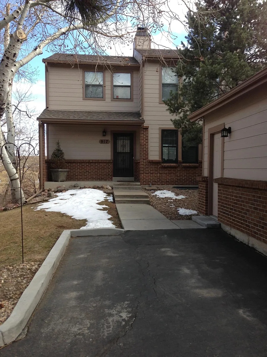 Front of house, including dedicated parking space and detached single garage - 917 Homestake Dr