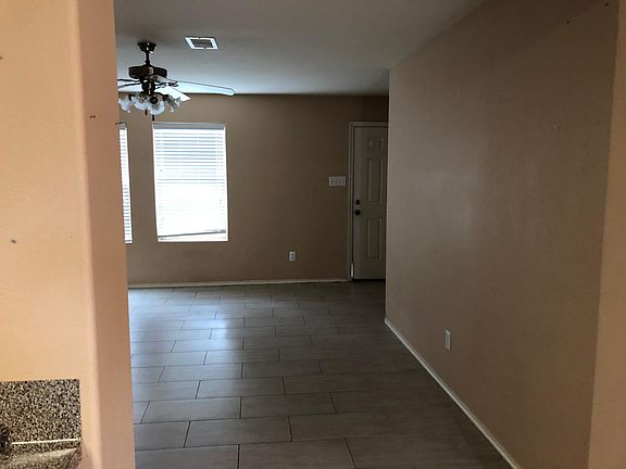 Living room to front door (from kitchen)