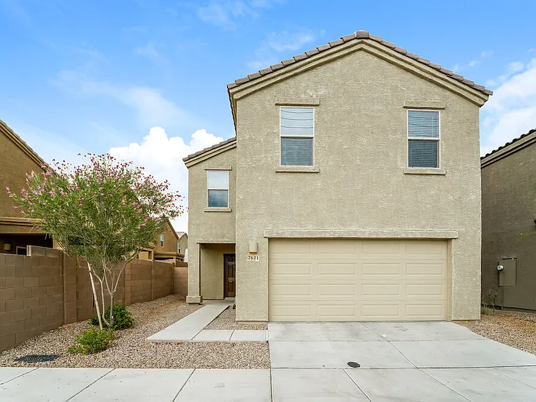 7621 W Valencia Rd — Photo 1