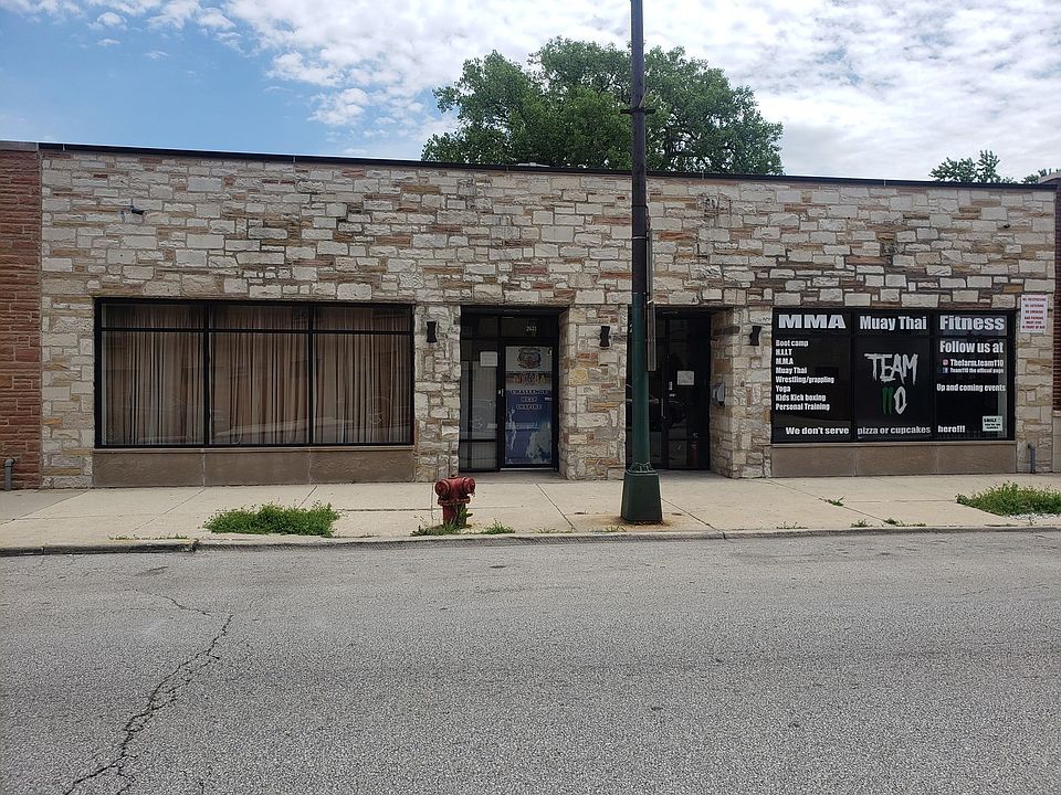 2 FRONT EXTERIOR STOREFRONTS OF BUILDING