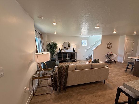Entryway featuring laminate flooring