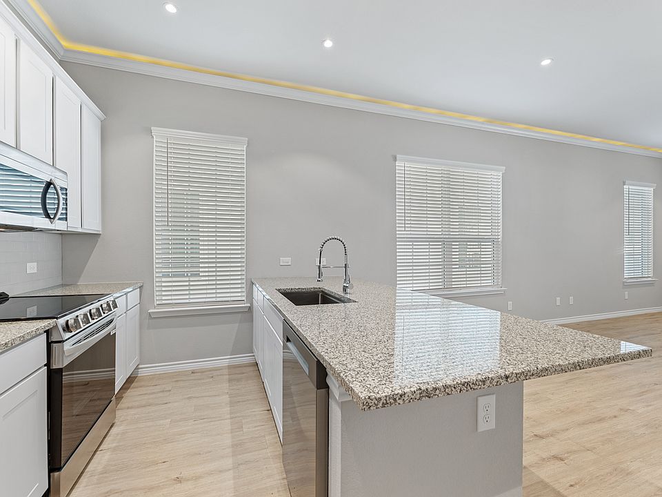 Kitchen with Stainless Steel Appliances - New Home