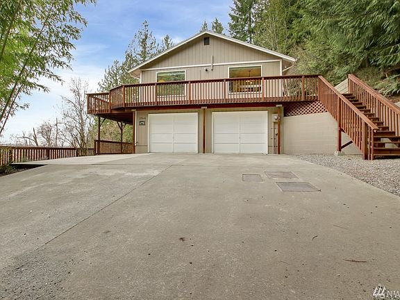Wrap around deck  plus lower observation area with new concrete patio!