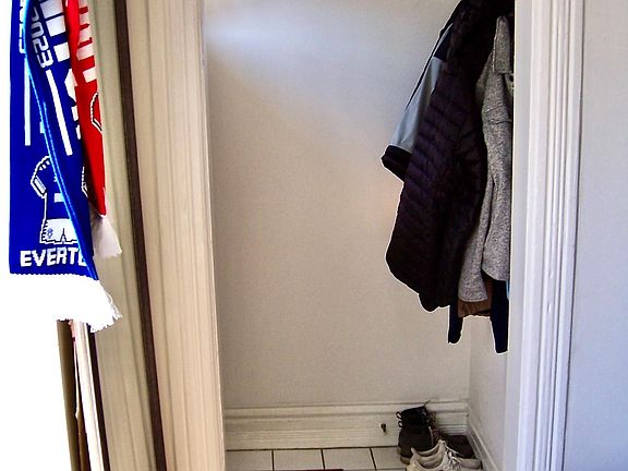 Entry foyer with coat rack into LR