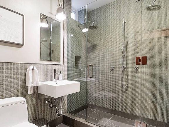 Luxury Double Rain Shower with Floor to Ceiling Ann Sacks Gl