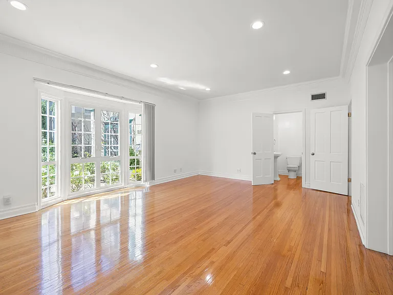 MAIN ROOM - LARGE BAY WINDOW PROVIDES TONS OF NATURAL LIGHT