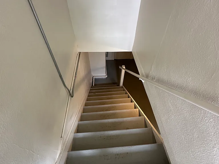 basement stairs to laundry