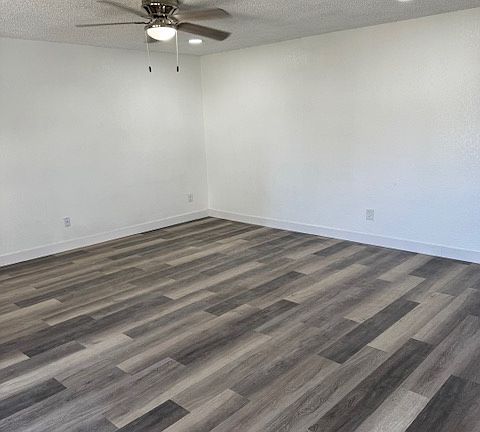 living room showing new light fixtures.