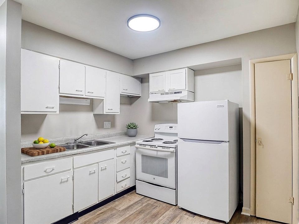Elevate your lifestyle at Maple Terrace, Roban, Colonial Arms. This modern kitchen features sleek cabinetry, ample counter space, and essential appliances, perfect for culinary enthusiasts. Explore your future home today!