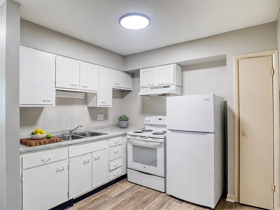 Elevate your lifestyle at Maple Terrace, Roban, Colonial Arms. This modern kitchen features sleek cabinetry, ample counter space, and essential appliances, perfect for culinary enthusiasts. Explore your future home today!