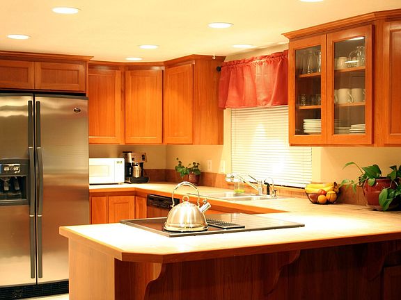Kitchen remodeled 2003 Solid Cherry cabinates.