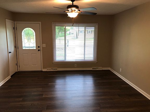 Living room & coat closet.
