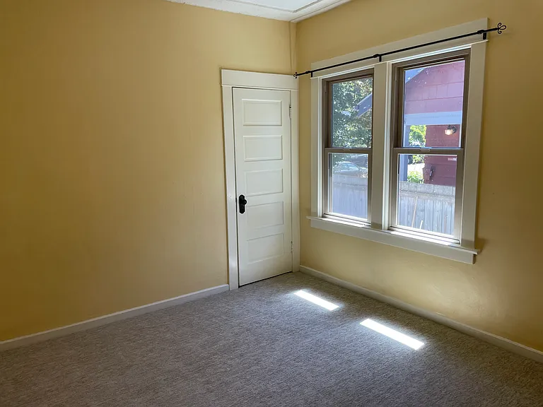 Second bedroom closet and new carpet.