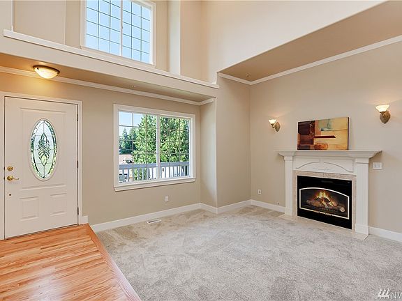 Entry & living room with 2-story ceiling
