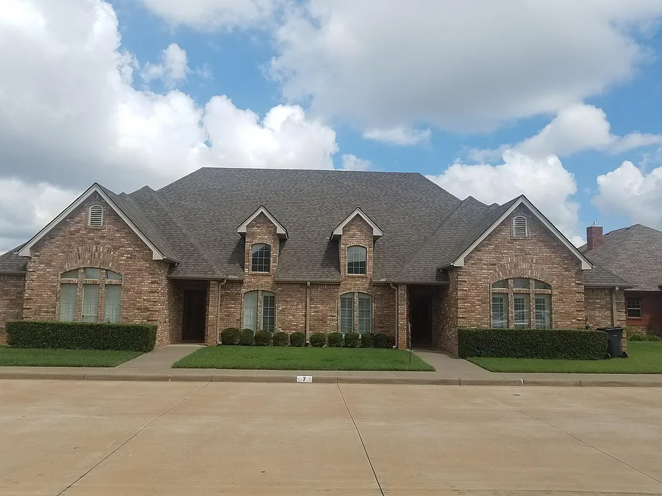 FRONT OF PROPERTY. THIS UNIT IS ON THE LEFT
