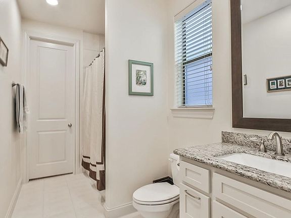 Full bathroom on first floor with lovely granite counter-tops