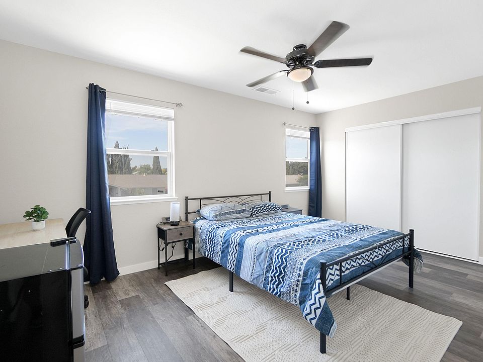 Large 2nd floor bedroom at the front of the house with 2 windows for plenty of natural light and a large closet