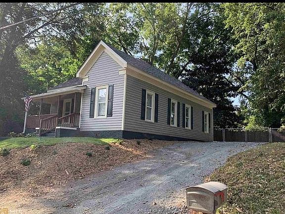 Parking on driveway behind fenced with drive through gate. Tenant responsible for maintenance and attend to yard service.