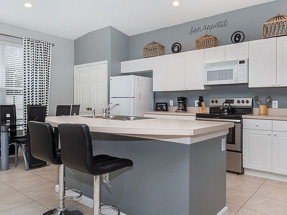4th image of 8208 Fan Palm Way #Id1246677p