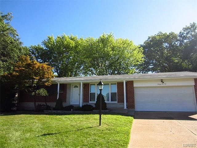 Welcome home to 9110 Cherry Brook Lane!