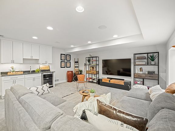 Basement with 75 inch TV, Wet Bar and Wine Fridge