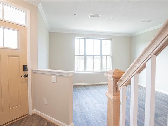 Large windows with tons of natural light. Upgraded floors through the 1st floor