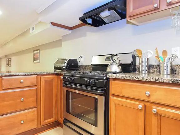 Range includes a range hood with light and fan