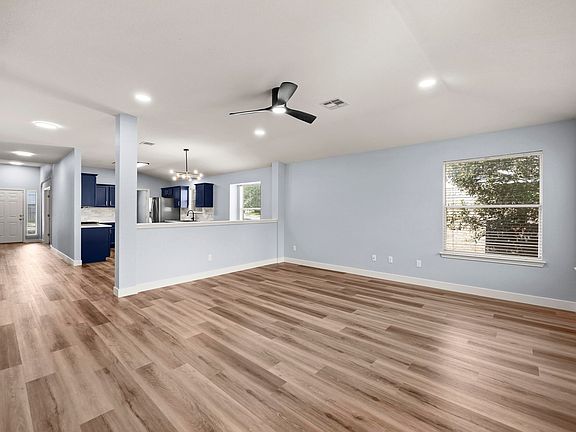 Large living room, overlooking the dining area and Chef's kitchen