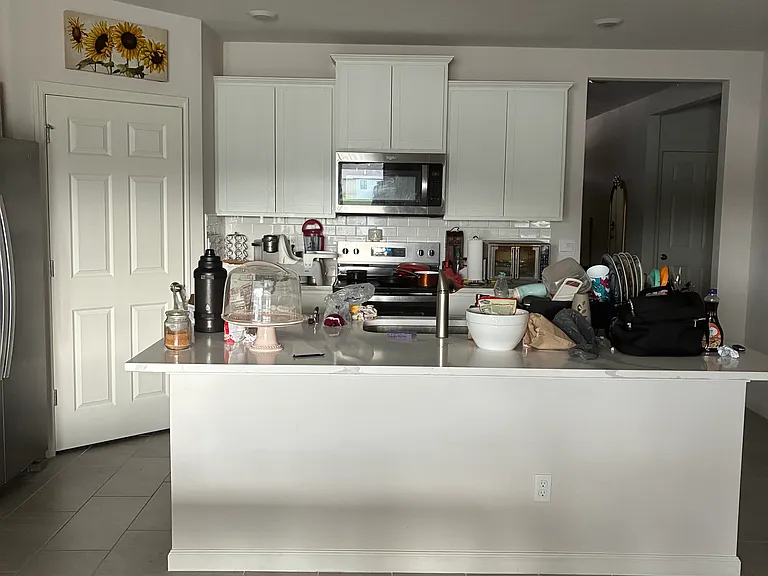 Kitchen with island and large pantry