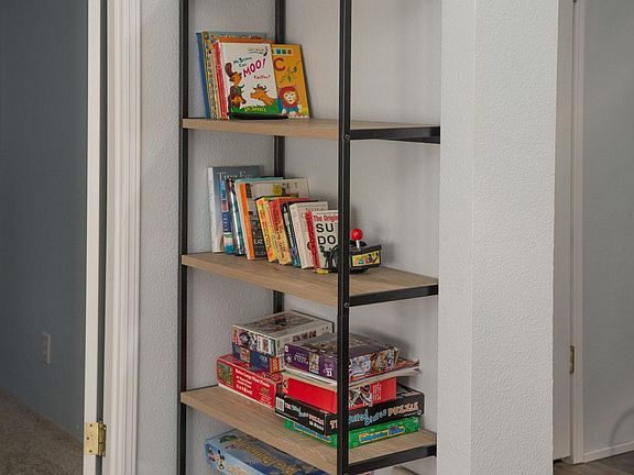 Book shelf in living room stays, fits perfectly