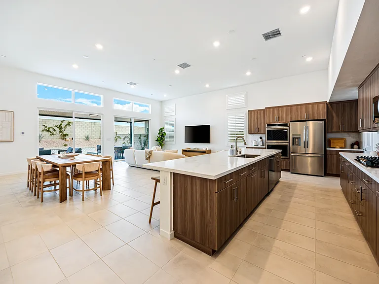 Everything flows together here _ kitchen, dining, and living as one.