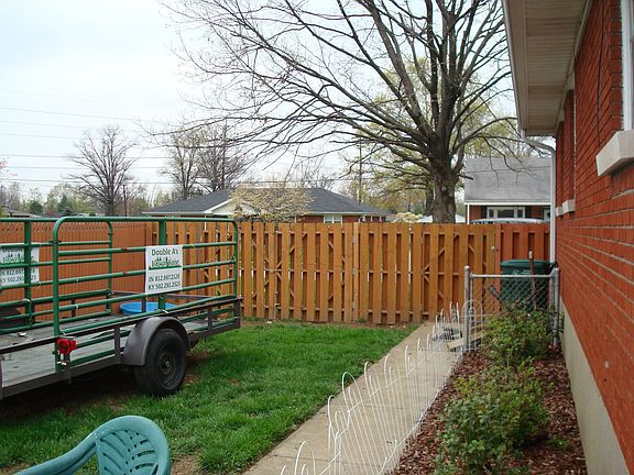 side yard with privacy fence