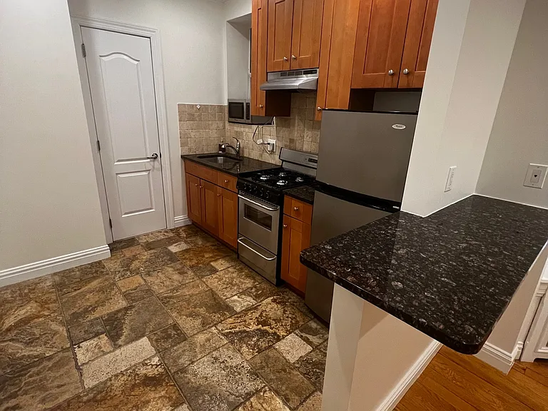348 E 65th St #7 — Photo 11